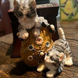 Vintage handmade sculpture two cats playing around a vase